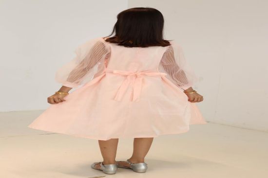 صورة فستان خربزي اكمام تل